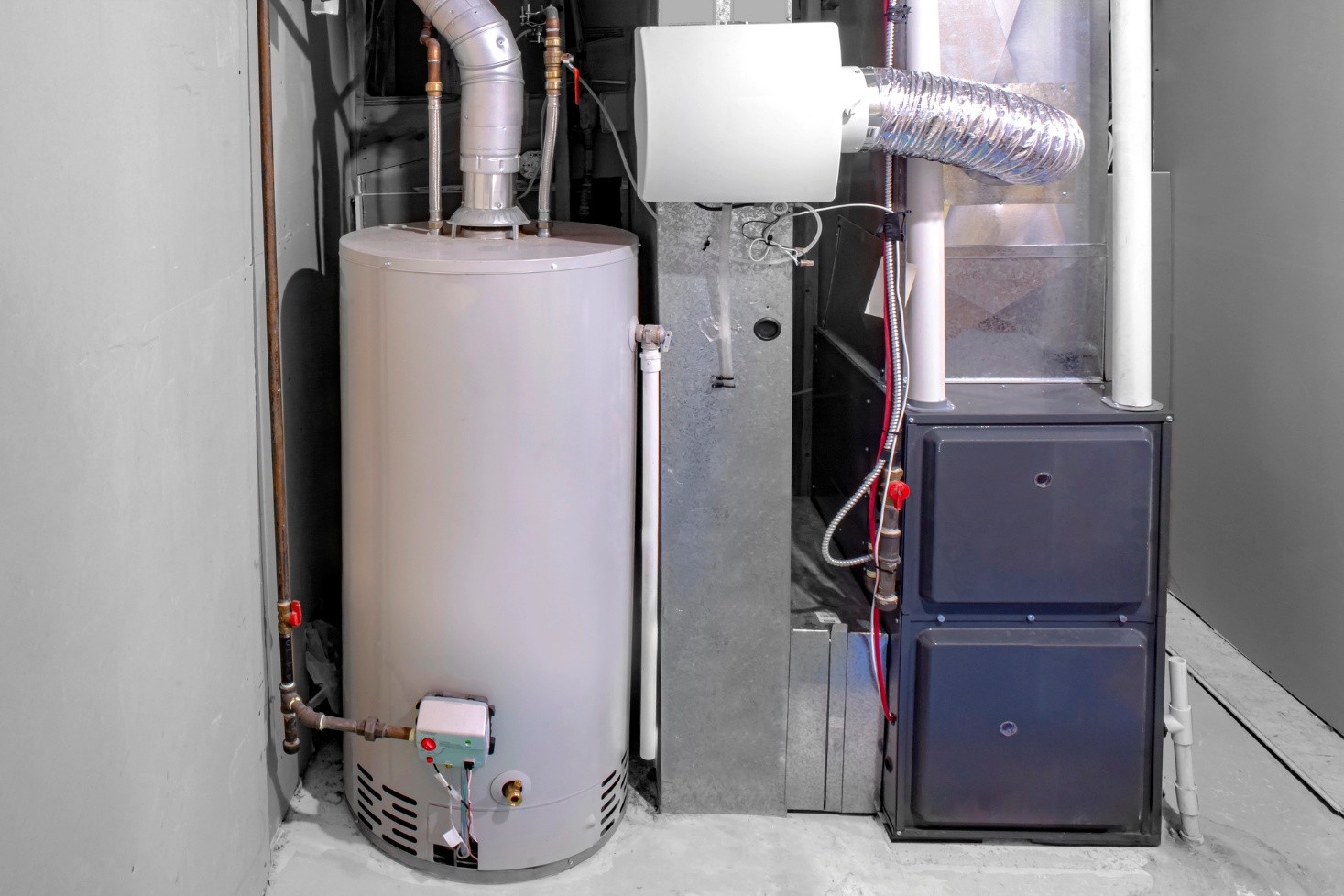 A high-efficiency furnace with a residential gas water heater.